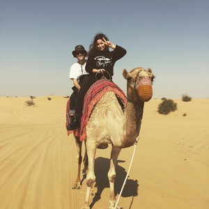 Riding Camel in Arabian Desert