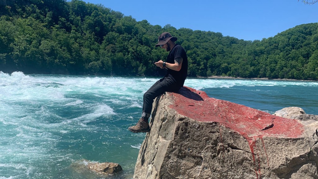Byoungz sitting on a rock at Whirlpool State Park in New York